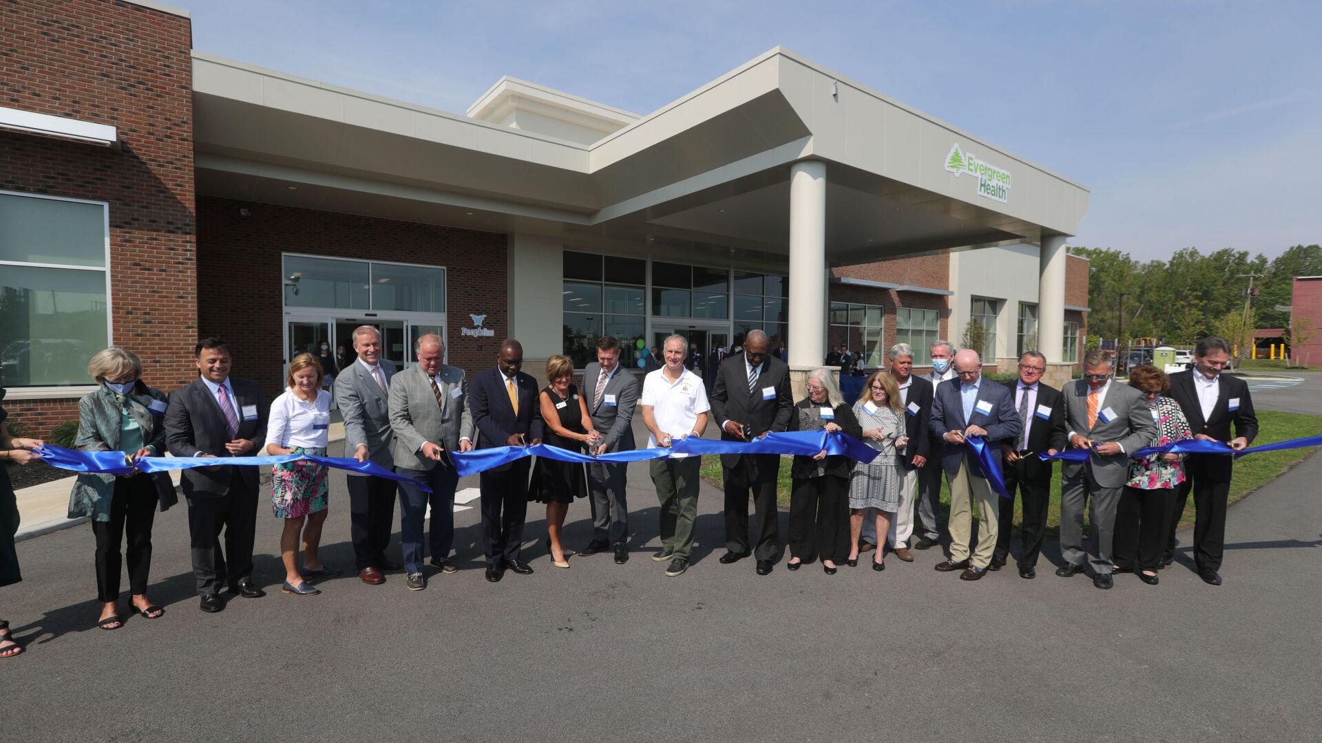 Ribbon cutting at the new expanded Health Services Building at 800 Hertel Ave.